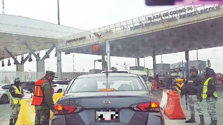 Crece inconformidad por largas filas en Puente II por revisiones de GN